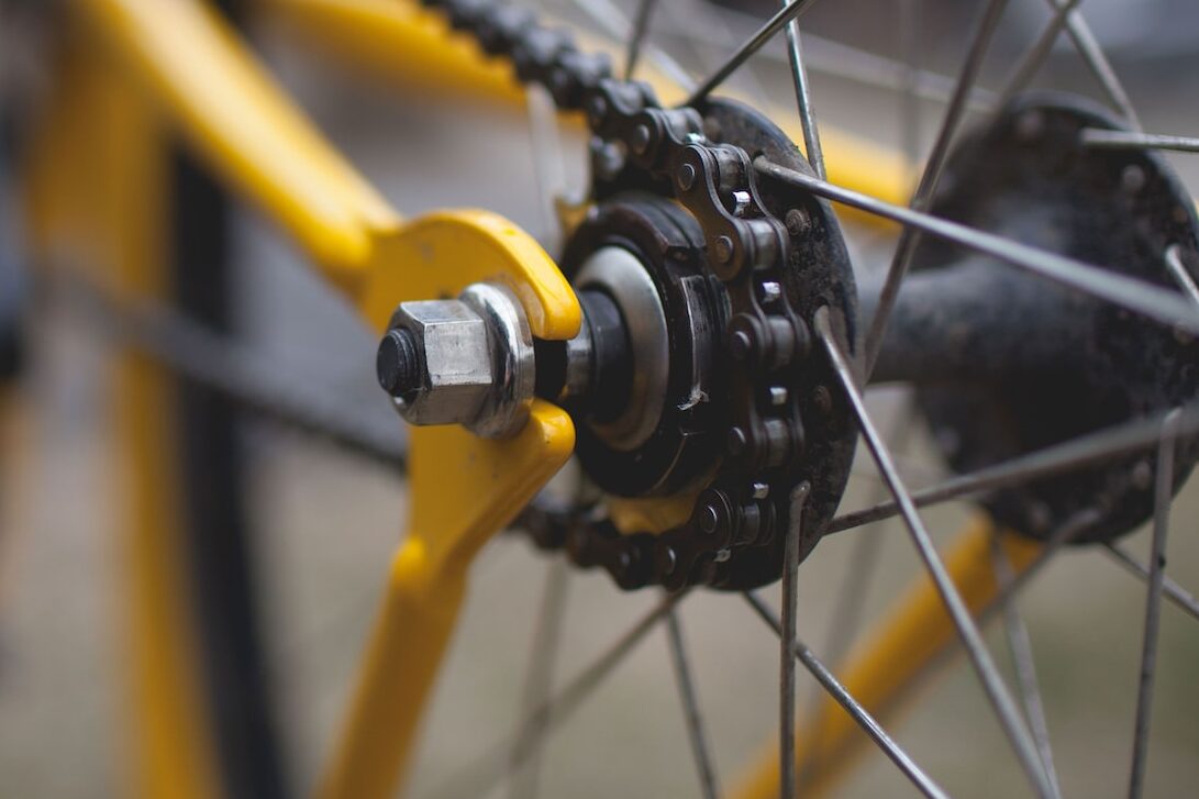 yellow and black bicycle close-up photography